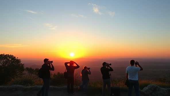 A picturesque landscape with a group of photographers capturing the sunset, each immersed in their craft, cameras in hand, surrounded by the beauty of nature, capturing the essence of artistic exploration and discovery.