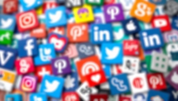 A vibrant and dynamic collage of popular social media icons blending together, symbolizing the interconnected nature of social media platforms and the diverse services offered by a Virtual Social Media Manager.