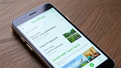 A smartphone screen displaying the GreenRoute Explorer app interface with eco-friendly travel recommendations, green accommodation options, carbon footprint trackers, and sustainable travel tips, promoting responsible and eco-conscious travel practices.