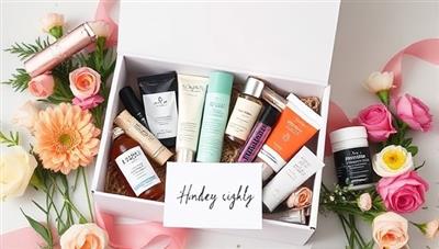 A beautifully designed beauty box with an array of deluxe beauty products spilling out, surrounded by fresh flowers and a handwritten note, creating a luxurious and personalized unboxing experience.