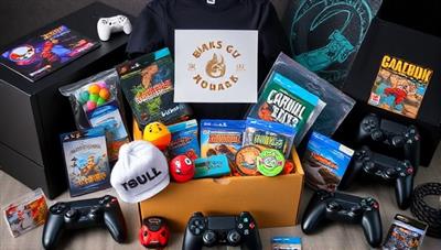 A creatively designed and visually appealing gaming merchandise subscription box filled with gaming collectibles, apparel, accessories, and themed items, surrounded by gaming consoles and controllers, showcasing the excitement and variety of products included in each box.