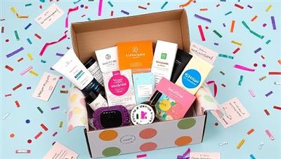 An eye-catching and colorful subscription box filled with various products like skincare items, accessories, and tech gadgets, surrounded by confetti and personalized notes, creating excitement and anticipation for the unboxing experience.