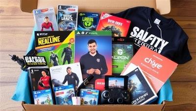 An assortment of gaming-themed products and collectibles displayed in a subscription box, featuring items like figurines, apparel, gaming accessories, and exclusive merchandise, with colorful packaging and themed inserts, inviting subscribers to explore and unbox their gaming surprises.