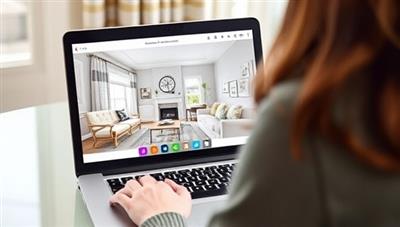 A laptop displaying a virtual interior design consultation session with a designer sharing screen visuals of room layouts, color schemes, and furniture suggestions, creating a collaborative and inspiring design process.