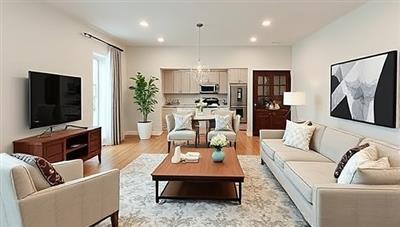 A digitally staged living room with virtual furniture and decor, seamlessly integrated into a real estate listing photo, showcasing the transformation and potential of Staging360's remote virtual home staging services.