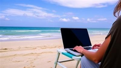A laptop on a beach setting with a person remotely working, enjoying the freedom of a digital nomad lifestyle, showcasing the flexibility and work-life balance promoted by NomadVantage Coaching.