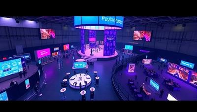 An immersive digital rendering of a virtual event space with interactive booths, stages, and networking areas, illustrating the dynamic and engaging virtual environments created by EventSphere Virtual for clients seeking innovative event solutions in the digital realm.