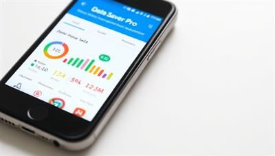 An engaging mobile screen display showing the Data Saver Pro app interface with colorful data usage charts, personalized recommendations for data optimization, and a user-friendly dashboard for managing mobile data expenses, emphasizing efficiency and savings.