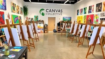 An art-filled studio space with easels, paint palettes, brushes, and colorful artworks adorning the walls, creating an inspiring and vibrant atmosphere that encourages artistic exploration and self-expression at Canvas Creations Collective.