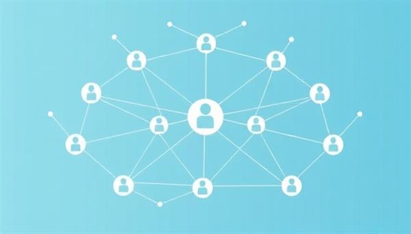 An illustration of interconnected nodes representing individuals forming a web of trust and shared risk, symbolizing the peer-to-peer insurance model and community collaboration.