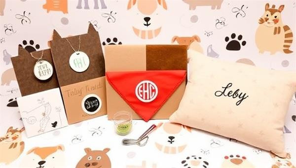 An assortment of personalized pet products displayed on a whimsical pet-themed backdrop, including custom pet tags, monogrammed bandanas, and embroidered pet beds, conveying creativity and tail-wagging joy.