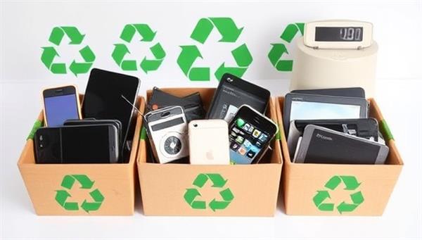 An array of old electronic devices like smartphones, laptops, and tablets being collected in eco-friendly containers, with green recycling symbols and a digital scale in the background, emphasizing the eco-friendly and tech-savvy approach of the business.