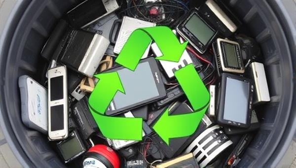 A collection of old electronic devices and gadgets piled up in a recycling bin, with green recycling symbols and arrows indicating the eco-friendly tech disposal process of EcoTech Renew, highlighting the sustainability and environmental impact of the tech recycling and upcycling service.